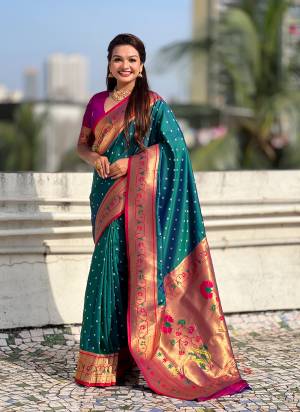 Garb These Party Wear Saree in Fine Colored.These Saree And Blouse is Fabricated On Soft Silk.Its Beautified With Weaving Bandhani Jari, Rich Paithani Meenakari Pallu Designer.