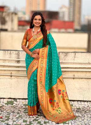 Garb These Party Wear Saree in Fine Colored.These Saree And Blouse is Fabricated On Soft Silk.Its Beautified With Weaving Bandhani Jari, Rich Paithani Meenakari Pallu Designer.