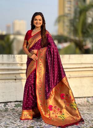 Garb These Party Wear Saree in Fine Colored.These Saree And Blouse is Fabricated On Soft Silk.Its Beautified With Weaving Bandhani Jari, Rich Paithani Meenakari Pallu Designer.