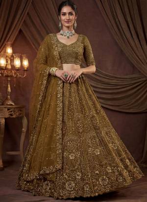 For A Fancy Designer Look,Grab These Lehenga Choli With Dupatta in Fine Colored.These Lehenga And Choli Are Satin And Dupatta Are Fabricated On Satin Pair.Its Beautified With Fancy Sequance, Dori Embroidery,Crystal Pipe Hand Work. 