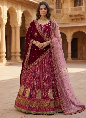For A Fancy Designer Look,Grab These Lehenga Choli With 2 Dupatta in Fine Colored.These Lehenga And Choli Are Gadhwal Silk And Dupatta Are Fabricated On Gadhwal Silk And Soft Net Pair.Its Beautified With Fancy Patch Work, Thread,Chapat Jari Embroidery Work. 