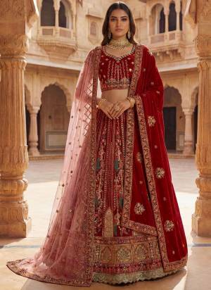 For A Fancy Designer Look,Grab These Lehenga Choli With 2 Dupatta in Fine Colored.These Lehenga And Choli Are Gadhwal Silk And Dupatta Are Fabricated On Gadhwal Silk And Soft Net Pair.Its Beautified With Fancy Patch Work, Thread,Chapat Jari Embroidery Work. 