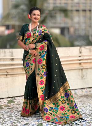 Garb These Party Wear Saree in Fine Colored.These Saree And Blouse is Fabricated On Paithani Silk.Its Beautified With Weaving Polaka Jari, Peacock Paithani Meenakari Pallu Designer.