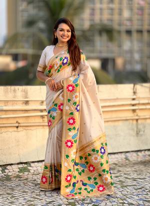 Garb These Party Wear Saree in Fine Colored.These Saree And Blouse is Fabricated On Paithani Silk.Its Beautified With Weaving Polaka Jari, Peacock Paithani Meenakari Pallu Designer.