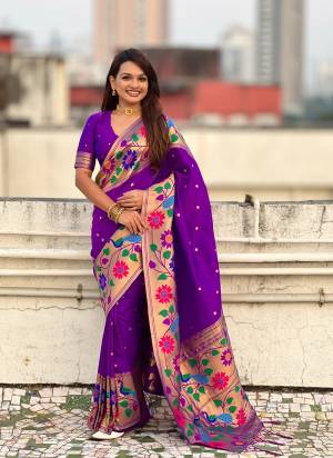 Garb These Party Wear Saree in Fine Colored.These Saree And Blouse is Fabricated On Paithani Silk.Its Beautified With Weaving Polaka Jari, Peacock Paithani Meenakari Pallu Designer.