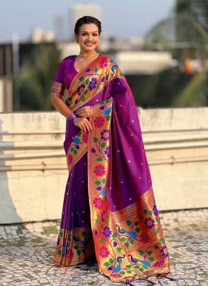 Garb These Party Wear Saree in Fine Colored.These Saree And Blouse is Fabricated On Paithani Silk.Its Beautified With Weaving Polaka Jari, Peacock Paithani Meenakari Pallu Designer.