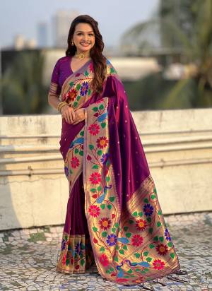 Garb These Party Wear Saree in Fine Colored.These Saree And Blouse is Fabricated On Paithani Silk.Its Beautified With Weaving Polaka Jari, Peacock Paithani Meenakari Pallu Designer.