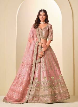 For A Designer Look,Grab These Party Wear Lehenga Choli in Fine Colored.These Lehenga And Blouse Are Fabricated On Art Silk Pair With Net Dupatta.Its Beautified With Designer Embroidery Work.