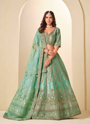 For A Designer Look,Grab These Party Wear Lehenga Choli in Fine Colored.These Lehenga And Blouse Are Fabricated On Art Silk Pair With Net Dupatta.Its Beautified With Designer Embroidery Work.