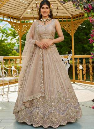 For A Fancy Designer Look,Grab These Lehenga Choli With Dupatta in Fine Colored.These Lehenga And Choli Are Satin And Dupatta Are Fabricated On Organza Pair.Its Beautified With Fancy Rainbow Sequance,Dori Embroidery,Motif And Crystal Hand Work. 