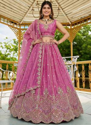 For A Fancy Designer Look,Grab These Lehenga Choli With Dupatta in Fine Colored.These Lehenga And Choli Are Satin And Dupatta Are Fabricated On Organza Pair.Its Beautified With Fancy Rainbow Sequance,Dori Embroidery,Motif And Crystal Hand Work. 