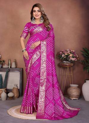 Garb These Festive Party Wear Saree in Fine Colored.These Saree And Blouse is Fabricated On Dola Silk.Its Beautified With Weaving JariBorder Designer With Hand Made Tied Bandhej .