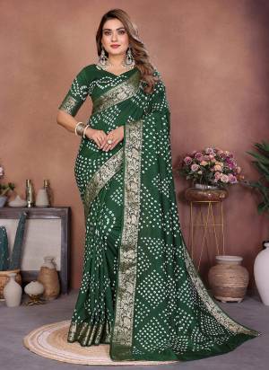 Garb These Festive Party Wear Saree in Fine Colored.These Saree And Blouse is Fabricated On Dola Silk.Its Beautified With Weaving JariBorder Designer With Hand Made Tied Bandhej .
