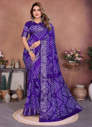 Garb These Festive Party Wear Saree in Fine Colored.These Saree And Blouse is Fabricated On Dola Silk.Its Beautified With Weaving JariBorder Designer With Hand Made Tied Bandhej .