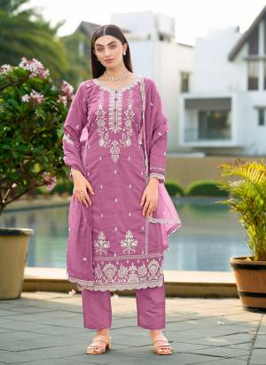 Garb These Designer Suit in Fine Colored Pair With Bottom And Dupatta.These Top Are Cotton And Dupatta Are Fabricated On Organza Pair With Cotton Bottom.Its Beautified With Cotton Inner.Its Beautified With Designer Thread Embroidery Work.