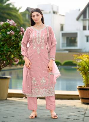 Garb These Designer Suit in Fine Colored Pair With Bottom And Dupatta.These Top Are Cotton And Dupatta Are Fabricated On Organza Pair With Cotton Bottom.Its Beautified With Cotton Inner.Its Beautified With Designer Thread Embroidery Work.