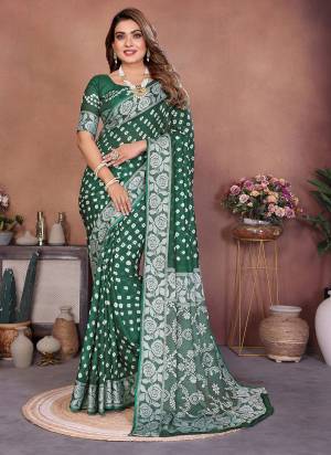 Attractive These Festive Wear Saree in Fine Colored.These Saree And Blouse is Fabricated On Viscose Silk.Its Beautified With Weaving Border Designer With Hand Made Bandhej Printed.
