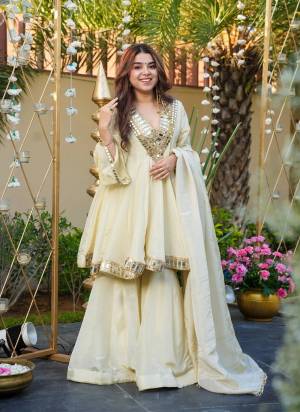 Garb These Suit in Fine Colored Pair With Bottom And Dupatta.These Top Are Chinon And Bottom Are Fabricated On Chinon Pair With Chinon Dupatta.Its Beautified With Designer Mirror Embroidery Work.