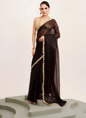 Looking These Party Wear Saree in Fine Colored.These Saree Are Jimmy Choo And Blouse is Gota Silk Fabricated.Its Beautified With Designer Sequance Codding Lace Border.