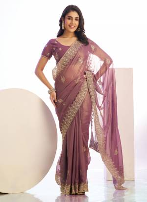 Grab These Party Wear Saree in Fine Colored Pair With Blouse.These Saree Are Tissue and Blouse Are Fabricated On Art Silk.Its Beautified With Designer Embroidery Work.