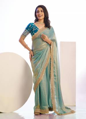Grab These Party Wear Saree in Fine Colored Pair With Blouse.These Saree Are Satin and Blouse Are Fabricated On Art Silk.Its Beautified With Designer Embroidery Work.