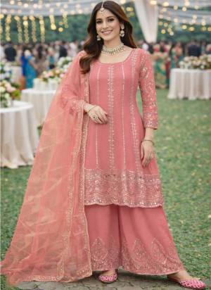  Looking These Party Wear Suit in Free Size Stitched Fine Colored Pair With Bottom And Dupatta.These Top Are Chinon And Dupatta Are Fabricated On Net Pair With Chinon Bottom.Its Beautified With Designer Mirror Embroidery Work.