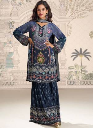 Looking These Party Wear Free Size Stitched Plazzo Suit in Fine Colored Pair With Dupatta.These Top And Bottom Are Crepe Silk And Dupatta Are Chiffon And Pair With Santoon Inner.Its Beautified With Printed Designer With Mirror Embroidery Work.