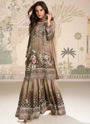 Looking These Party Wear Free Size Stitched Plazzo Suit in Fine Colored Pair With Dupatta.These Top And Bottom Are Crepe Silk And Dupatta Are Chiffon And Pair With Santoon Inner.Its Beautified With Printed Designer With Mirror Embroidery Work.