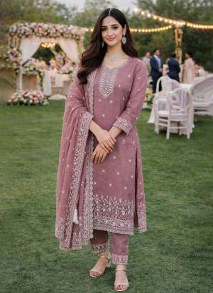 Garb These Designer Suit in Fine Colored Pair With Bottom And Dupatta.These Top Are Gold Crush And Dupatta Are Fabricated On Gold Crush Pair With Gold Crush Bottom.Its Beautified With Designer Embroidery Work.