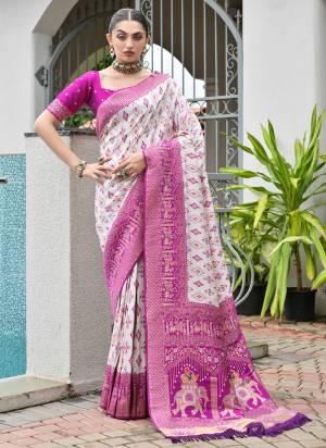 Attractive These Festive And Party Wear Saree in Fine Colored.These Saree And Blouse is Fabricated On Banarasi Silk.Its Beautified With Woven Ajarakh Patola Meenakari Designer.