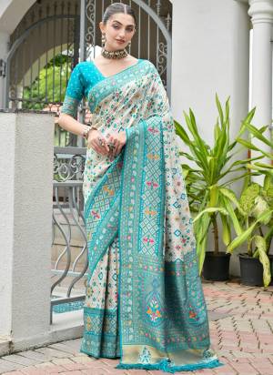 Attractive These Festive And Party Wear Saree in Fine Colored.These Saree And Blouse is Fabricated On Banarasi Silk.Its Beautified With Woven Ajarakh Patola Meenakari Designer.