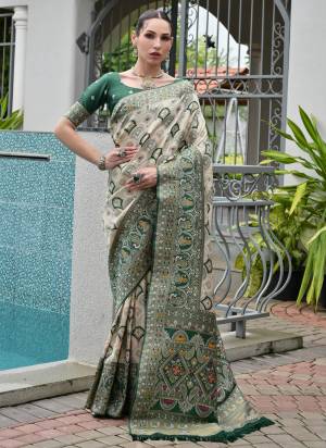 Attractive These Festive And Party Wear Saree in Fine Colored.These Saree And Blouse is Fabricated On Banarasi Silk.Its Beautified With Woven Ajarakh Patola Meenakari Designer.