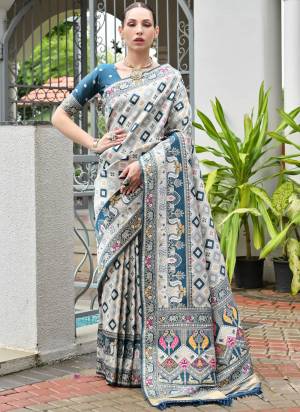 Attractive These Festive And Party Wear Saree in Fine Colored.These Saree And Blouse is Fabricated On Banarasi Silk.Its Beautified With Woven Ajarakh Patola Meenakari Designer.