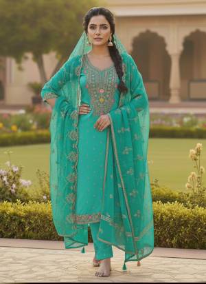 Looking These Disigner Suit in Fine Colored Pair With Bottom And Dupatta.These Top Are Chanderi Butti And Dupatta Are Fabricated On Organza Pair With Santoon Bottom.Its Beautified With Woven Designer With Embroidery Work.