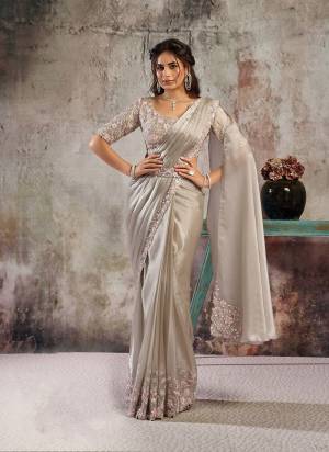Look Attrective These Designer Party Wear Ready To Wear Saree With Blouse in Fine Colored.These Saree Are Armani Satin Silk And Blouse Milky Satin is Fabricated.Its Beautified Heavy Fancy Desiger Embroidery With Hand Work .