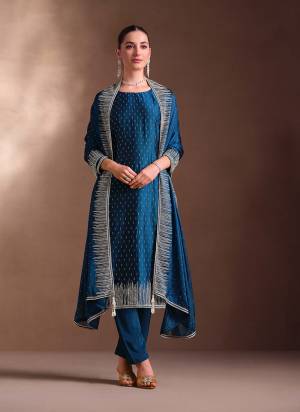 Attractive These Party Wear Salwar Suit in Fine Colored Pair With Bottom And Dupatta.These Top And Dupatta Are Fabricated On Two Tone Cotanic Georgette Pair With Santoon Bottom.Its Beautified With Designer Embroidery With Swarovski Work.