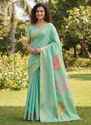 Garb These Fastive And Party Wear Saree in Fine Colored.These Saree And Blouse is Fabricated On Linen Cotton.Its Beautified With Heavy Woven Resham Designer.