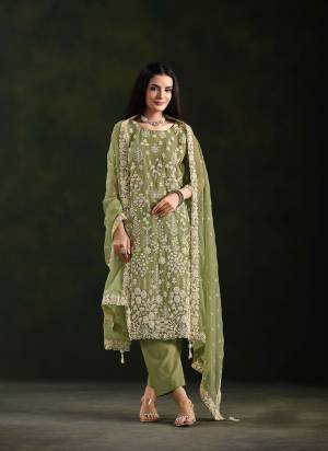 Looking These Party Wear Salwar Suit in Fine Colored Pair With Bottom And Dupatta.These Top And Dupatta Are Fabricated On Crinkle Chiffon Pair With Santoon Bottom.Its Beautified With Designer Embroidery With Hand Work.
