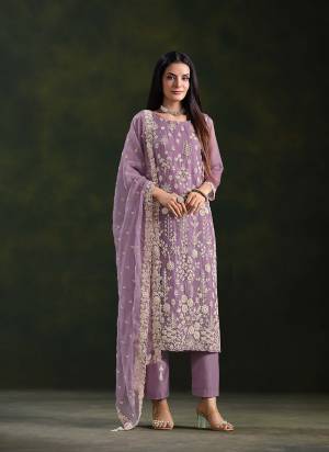 Looking These Party Wear Salwar Suit in Fine Colored Pair With Bottom And Dupatta.These Top And Dupatta Are Fabricated On Crinkle Chiffon Pair With Santoon Bottom.Its Beautified With Designer Embroidery With Hand Work.