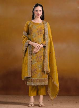 Attractive These Party Wear Salwar Suit in Fine Colored Pair With Bottom And Dupatta.These Top And Dupatta Are Fabricated On Gold Crinkle Organza Chiffon Pair With Santoon Bottom.Its Beautified With Designer Embroidery With Zarkan Work.