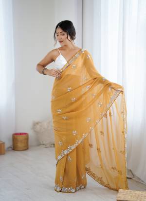 Looking These Party Wear Saree in Fine Colored.These Saree Are Chiffon Crush And Blouse is Ultra Stin Fabricated.Its Beautified With Designer Sequance,Moti,Cte Dana Embroidery Work.