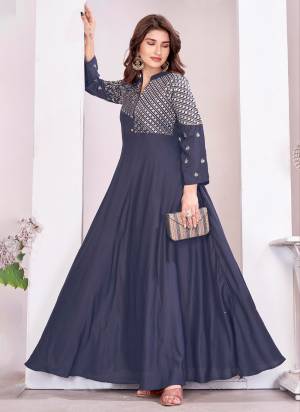 Grab These Beautiful Looking Readymade Gown.These Gown is Fabricated On Muslin.Its Beautified With Designer Embroidery Work.