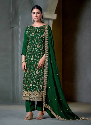 Garb These Party Wear Salwar Suit in Fine Colored Pair With Bottom And Dupatta.These Top And Dupatta Are Fabricated On Satin Chiffon Pair With Santoon Bottom.Its Beautified With Heavy Designer Embroidery With Hand Work.