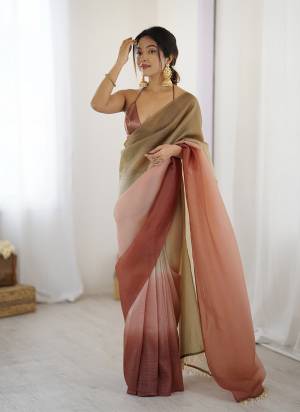 Attrective These Party Wear Ready To Wear Saree in Fine Two Tone Colored.These Saree Are Candy Crush Silk And Blouse is Satin Silk Fabricated.Its Beautified With Pedding Color Solid With Latkan Lace.