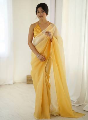 Attrective These Party Wear Ready To Wear Saree in Fine Two Tone Colored.These Saree Are Candy Crush Silk And Blouse is Satin Silk Fabricated.Its Beautified With Pedding Color Solid With Latkan Lace.