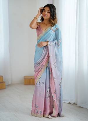 Looking These Party Wear Saree in Fine Pedding Colored.These Saree Are Satin Chiffon And Blouse is Satin Chiffon Fabricated.Its Beautified With Pedding Color With Hand Printed Designer With Sequance,Dori Embroidery Work.