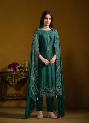 Attractive These Party Wear Salwar Suit in Fine Colored Pair With Bottom And Dupatta.These Top And Dupatta Are Fabricated On Two Tone Cotanic Georgette Pair With Santoon Bottom.Its Beautified With Designer Embroidery With Swarovski Work.