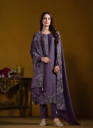 Attractive These Party Wear Salwar Suit in Fine Colored Pair With Bottom And Dupatta.These Top And Dupatta Are Fabricated On Two Tone Cotanic Georgette Pair With Santoon Bottom.Its Beautified With Designer Embroidery With Swarovski Work.
