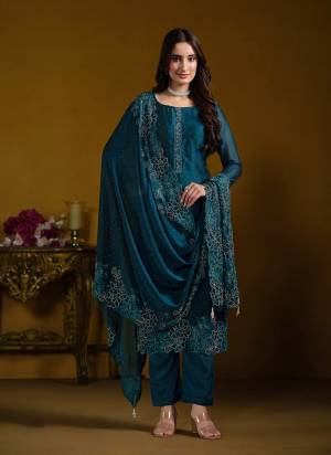 Attractive These Party Wear Salwar Suit in Fine Colored Pair With Bottom And Dupatta.These Top And Dupatta Are Fabricated On Two Tone Cotanic Georgette Pair With Santoon Bottom.Its Beautified With Designer Embroidery With Swarovski Work.