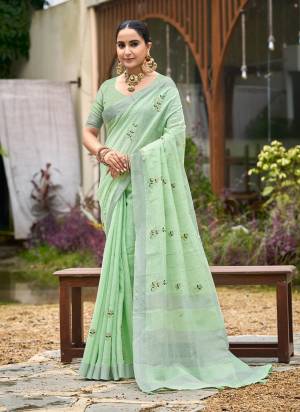 Garb These Fastive And Party Wear Saree in Fine Colored.These Saree And Blouse is Fabricated On Linen.Its Beautified With Heavy Woven Border Designer With Embroidery work.